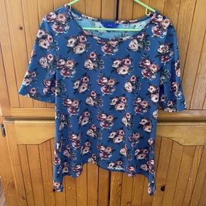 Cute 90% polyester blouse.  Soft and comfy.